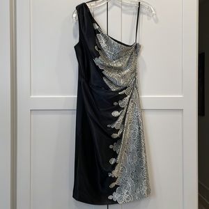 Black and white cocktail dress, one shoulder with elegant white lace print.